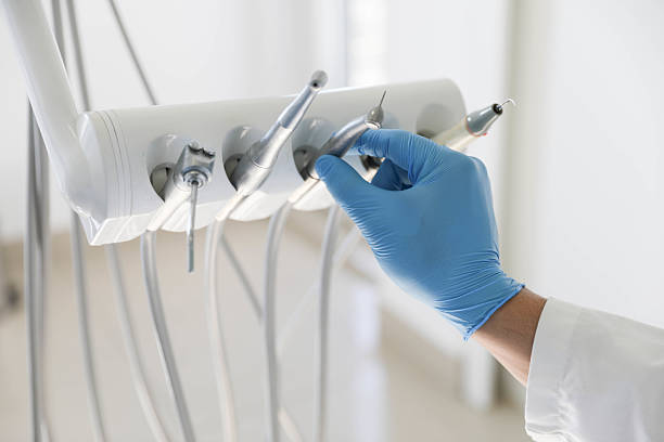 Professional Tooth Extraction technician working in Woodhaven, MI